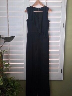 Bebe Sleeveless Black Ruffle-Front Jumpsuit